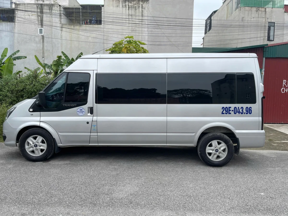 White 16-seat private van — up to 16 passengers at one flat vehicle price