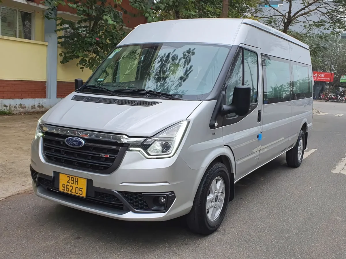 Silver 16-seat private van showing current-generation design