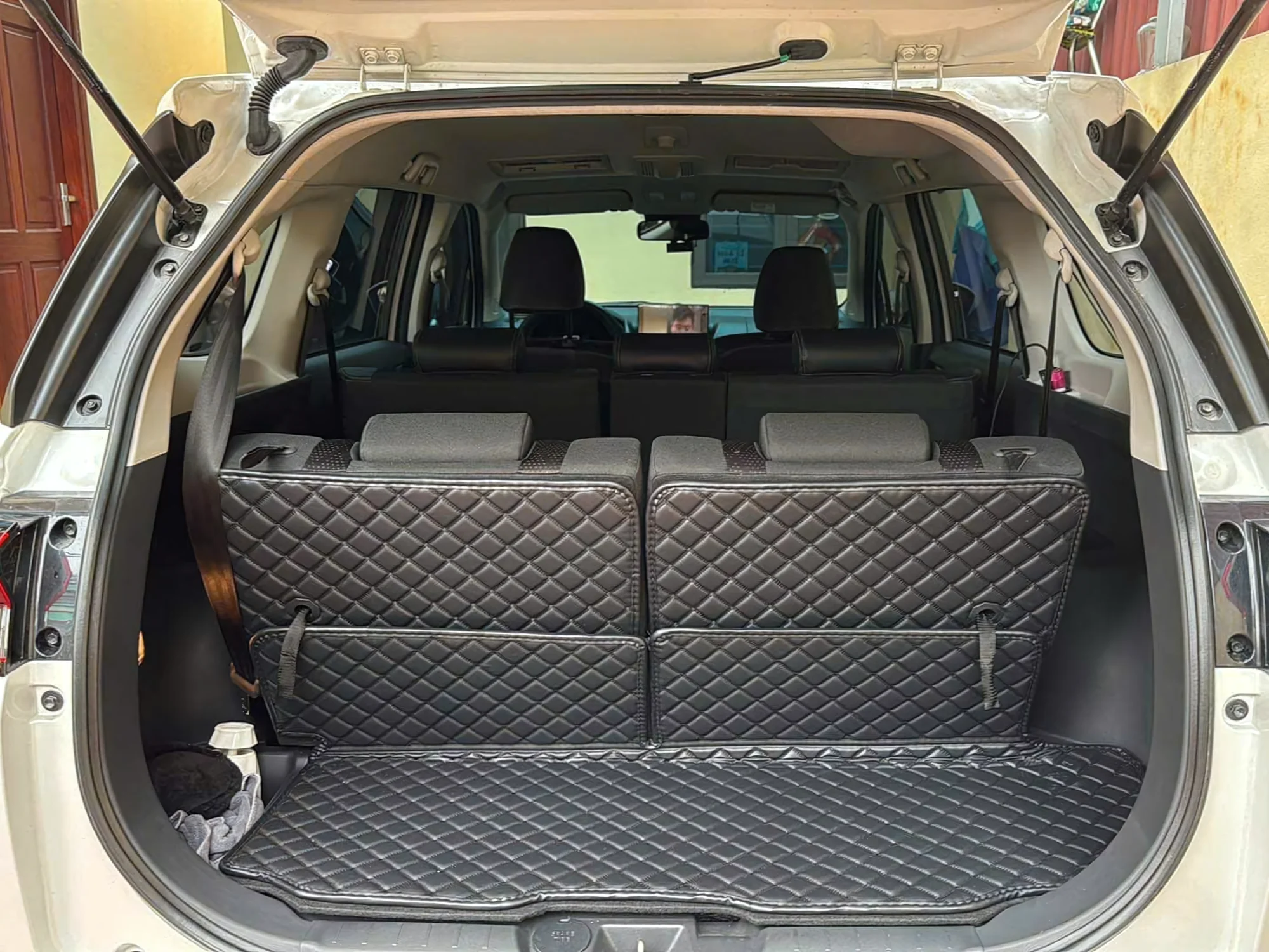 7-seat SUV cargo area with rear seats folded flat for maximum luggage