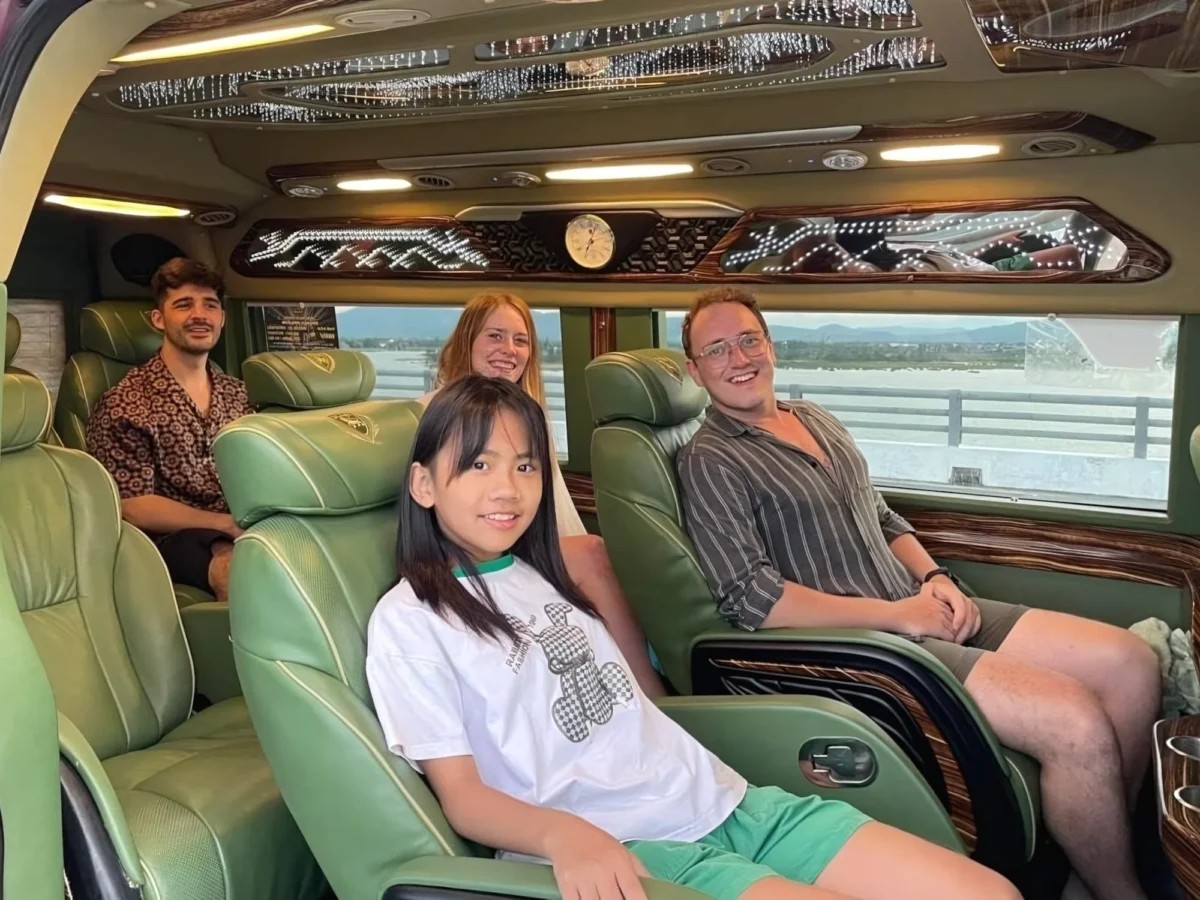 Passengers relaxing in a VIP private van with scenic views through the windows