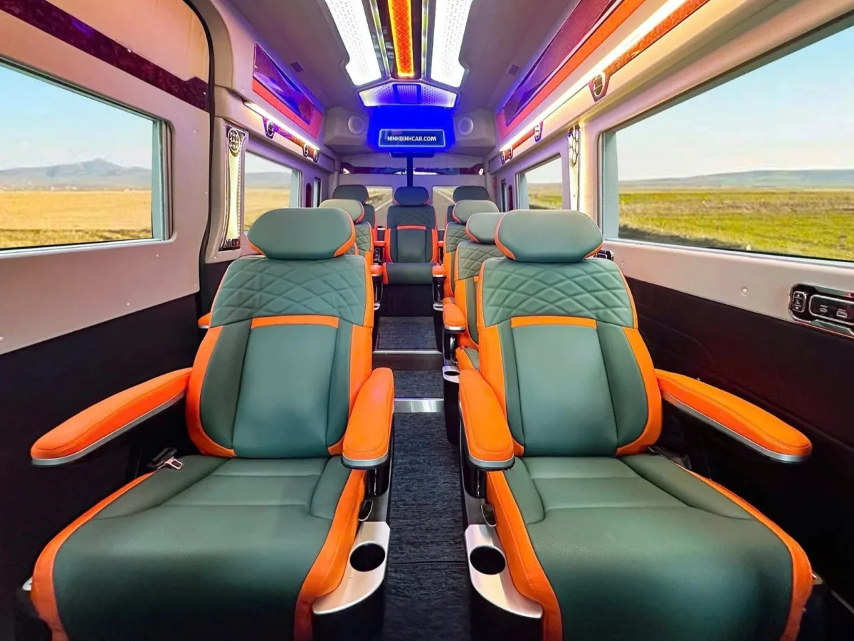 Green and orange leather captain seats — distinctive VIP van interior option